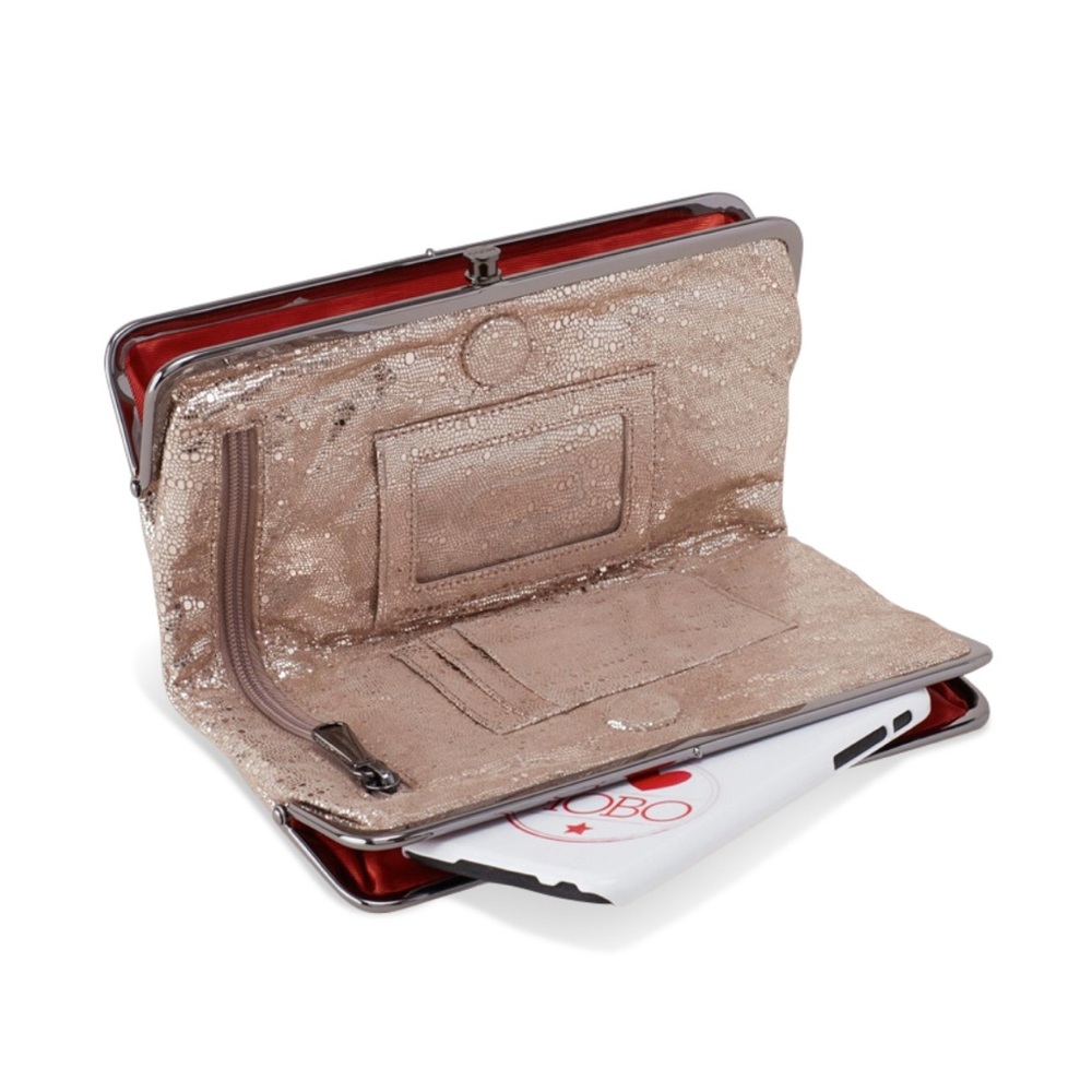 HOBO lauren clutch wallet in distressted platinum/hot pink lining